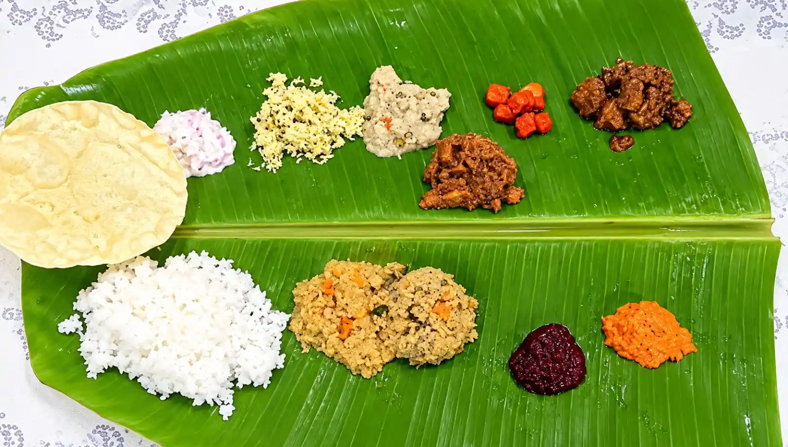 Vegetarian lunch meal with traditional Indian accompaniments